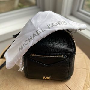 MK backpack or crossbody.